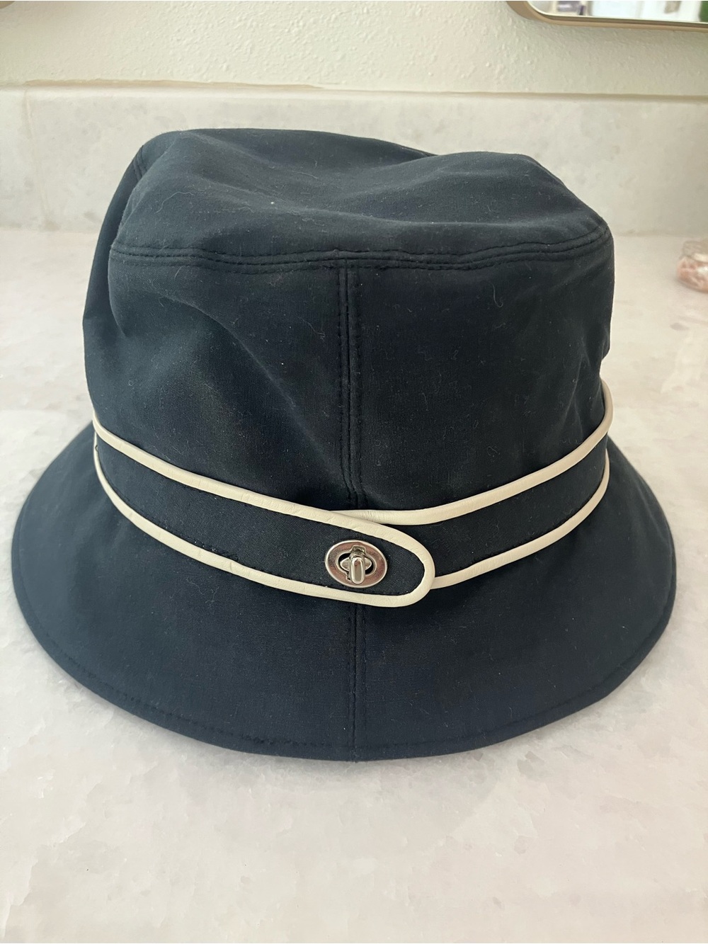 Coach Black bucket hat with cream color detail and silver clasp-vintage
